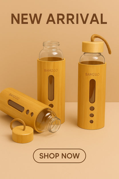 Set of glass bottles with yellow accents on a beige background, featuring the brand 'BAMBOO'.